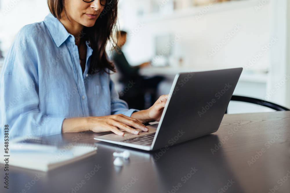 Aufkleber web designer working on a laptop in an office