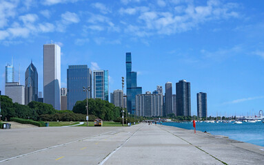 Chicago Lakefront trail with downtown skyline and Navy Pier in the distance - 548538312