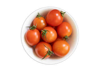 Ripe tomato in a plate isolated