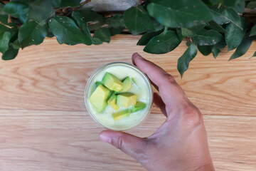 blended avocado , avocado smoothie or avocado  yogurt or avocado milk