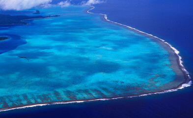 French Polynesia: Aerial shot of the coral reef around Bora Bora Island