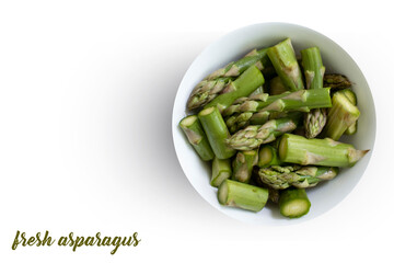 Fresh asparagus in a plate isolated on white background