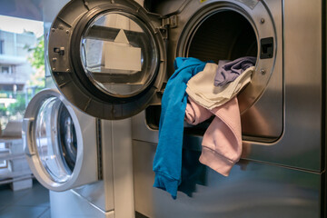 Front-load washers in a communal self-service laundry