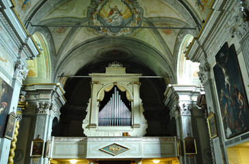 Ornate Columns and Organ in Old Decorated Church 