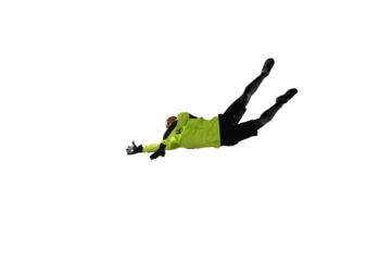 Soccer goalkeeper jumps to defend his team during a football game