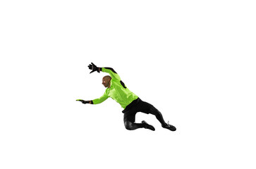 Fototapeta na wymiar Soccer goalkeeper jumps to defend his team during a football game