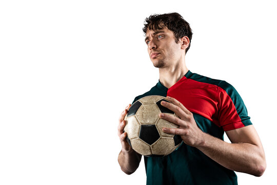 Football player holds the ball and he is ready to play with soccer