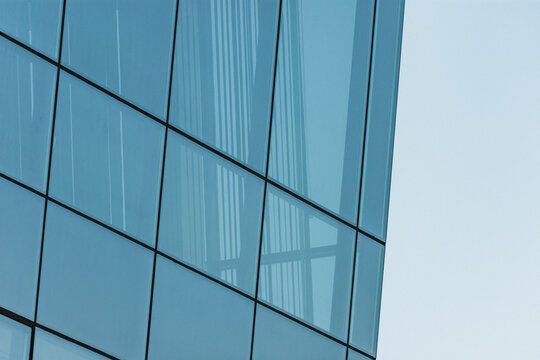 Close up to a window grid wall of a business building