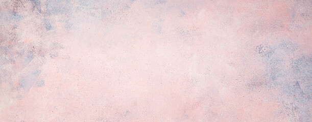 Light pink concrete background. The texture of concrete. Horizontal, panoramic view.