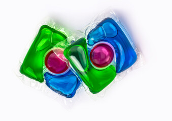 capsules with colored gel for washing on a white background