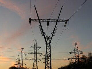 Close up high-voltage power line on blue sky as electricity collection	