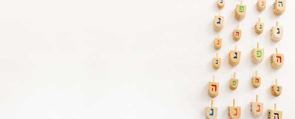 image of jewish holiday Hanukkah background of spinning tops