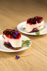 Pannacotta with berry jelly and violet