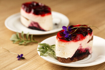 dessert with berry jelly and violet flowers