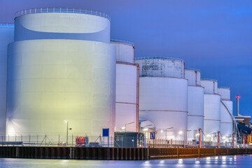 Storage tanks for fossil fuels at night seen in Berlin