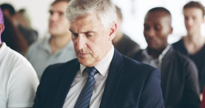 Business people, audience and serious work seminar for company employee, interracial presentation or workshop. Diversity, crowd of concerned office workers and conference meeting for startup stress
