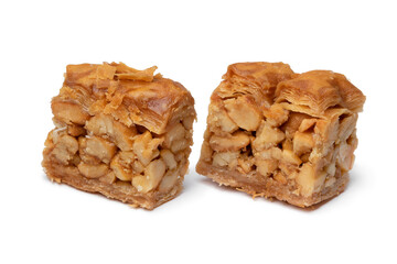Pair of traditional Syrian cookies stuffed with nuts isolated on white background