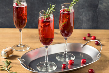 Boozy Refreshing Poinsettia Cranberry Champagne Cocktail