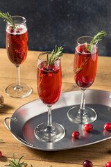 Boozy Refreshing Poinsettia Cranberry Champagne Cocktail