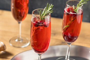 Boozy Refreshing Poinsettia Cranberry Champagne Cocktail