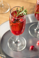 Boozy Refreshing Poinsettia Cranberry Champagne Cocktail