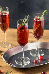 Boozy Refreshing Poinsettia Cranberry Champagne Cocktail