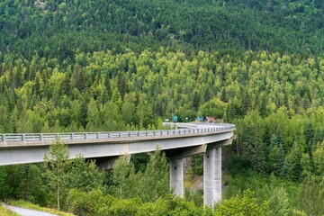 Scenic shot of a road along the Chugach Mountains in Alaska, USA