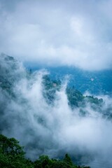 Mountain covered by fog on a gloomy day