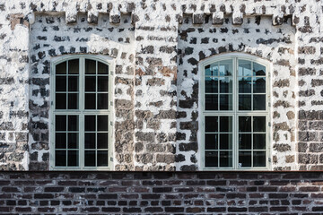 Fototapeta na wymiar Windows on old industry building