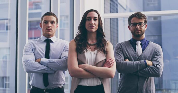 Portrait, leadership and pride of business people with serious face, arms crossed in office. Teamwork, collaboration and group of corporate people in workplace with confidence, power and strength