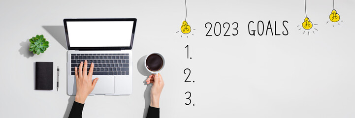 2023 goals with person using a laptop computer - obrazy, fototapety, plakaty