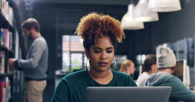 Laptop, education and black woman in library for learning students in college, school or university campus. Future, creative and African girl working, typing or studying online research report data