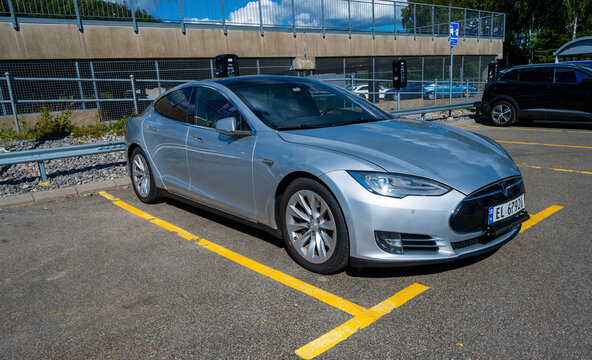 Ullared, Sweden - July 30 2022: Silver 2015 Tesla Model S electric car on a parking lot.