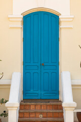 Old wooden door painted blue, Laos