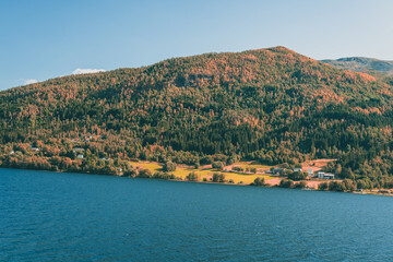 Fototapeta premium Mountains during moody weather in autumn Norway with a fjord