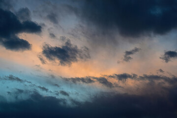 Naklejka na ściany i meble Photo of the evening sky with storm clouds