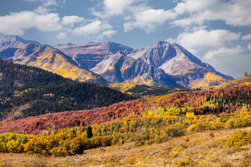 Fall colors glowing on the mountains