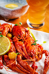 Crayfish. Red boiled crawfishes on table in rustic style