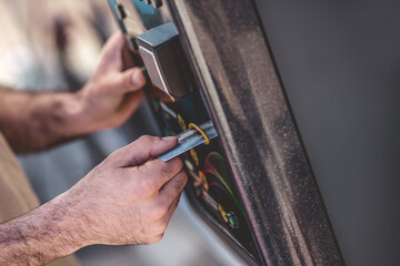 Person standing before a cutting-edge self-service payment terminal