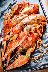 Crayfish. Red boiled crawfishes on table in rustic style