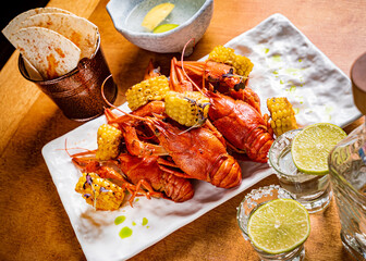 Crayfish. Red boiled crawfishes on table in rustic style
