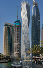 Fototapeta na wymiar Dubai's World’s tallest twisted tower, Cayan tower in Dubai Marina