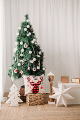 close up of beautiful Christmas decoration at home, christmas tree, gifts and ornaments
