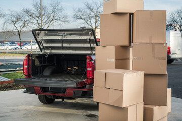 Moving Boxes Ready to Be Loaded Into the Pickup Truck