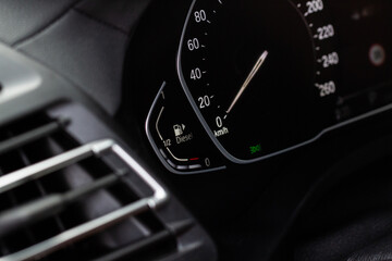 Fuel gauge close up. Car fuel dashboard details.