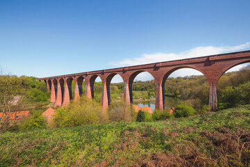 Larpool Viaduct, or Esk Valley Viaduct, a 13 arch brick viaduct built to carry the Scarborough and Whitby Railway over the River Esk, North Yorkshire, England, UK.