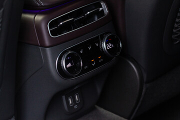 Obraz na płótnie Canvas Digital control panel car air conditioner dashboard. Modern car interior conditioning buttons inside a car close up view.