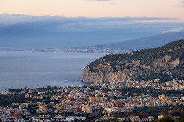 Fototapeta na wymiar Aerial View of Touristic Town, Sorrento, Italy. Coast of Tyrrhenian Sea. Sunset Sky