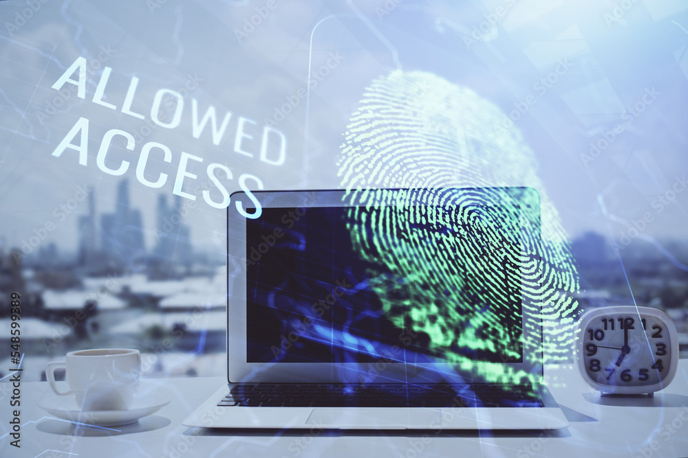 Poster Computer on desktop in office with finger print drawing. Double exposure. Concept of business data security.