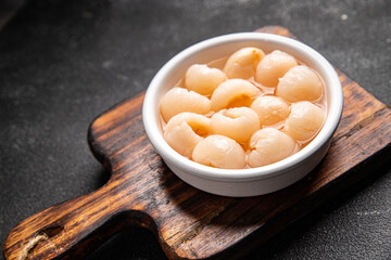 lychee canned fruit fresh delicious snack healthy meal food snack diet on the table copy space food background rustic top view